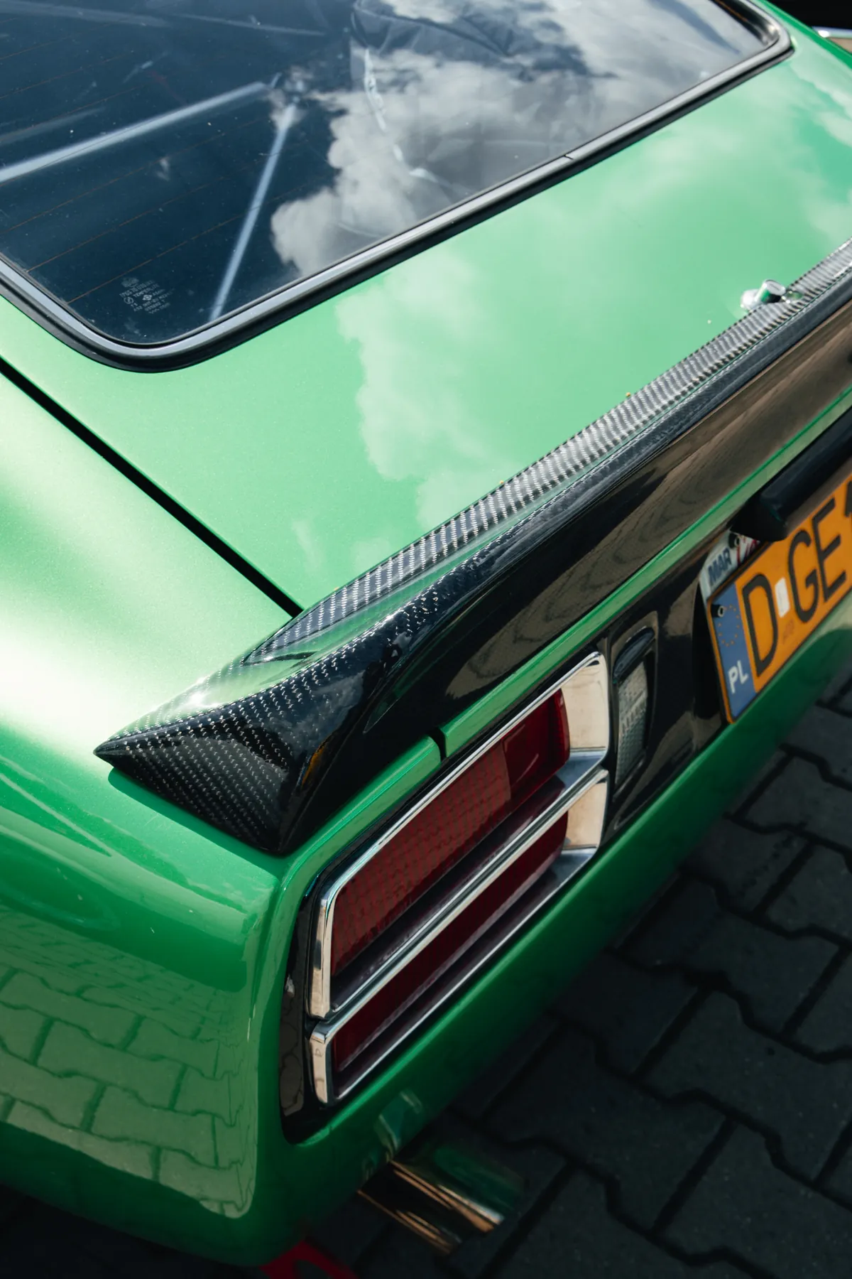 Detail of a green modified car