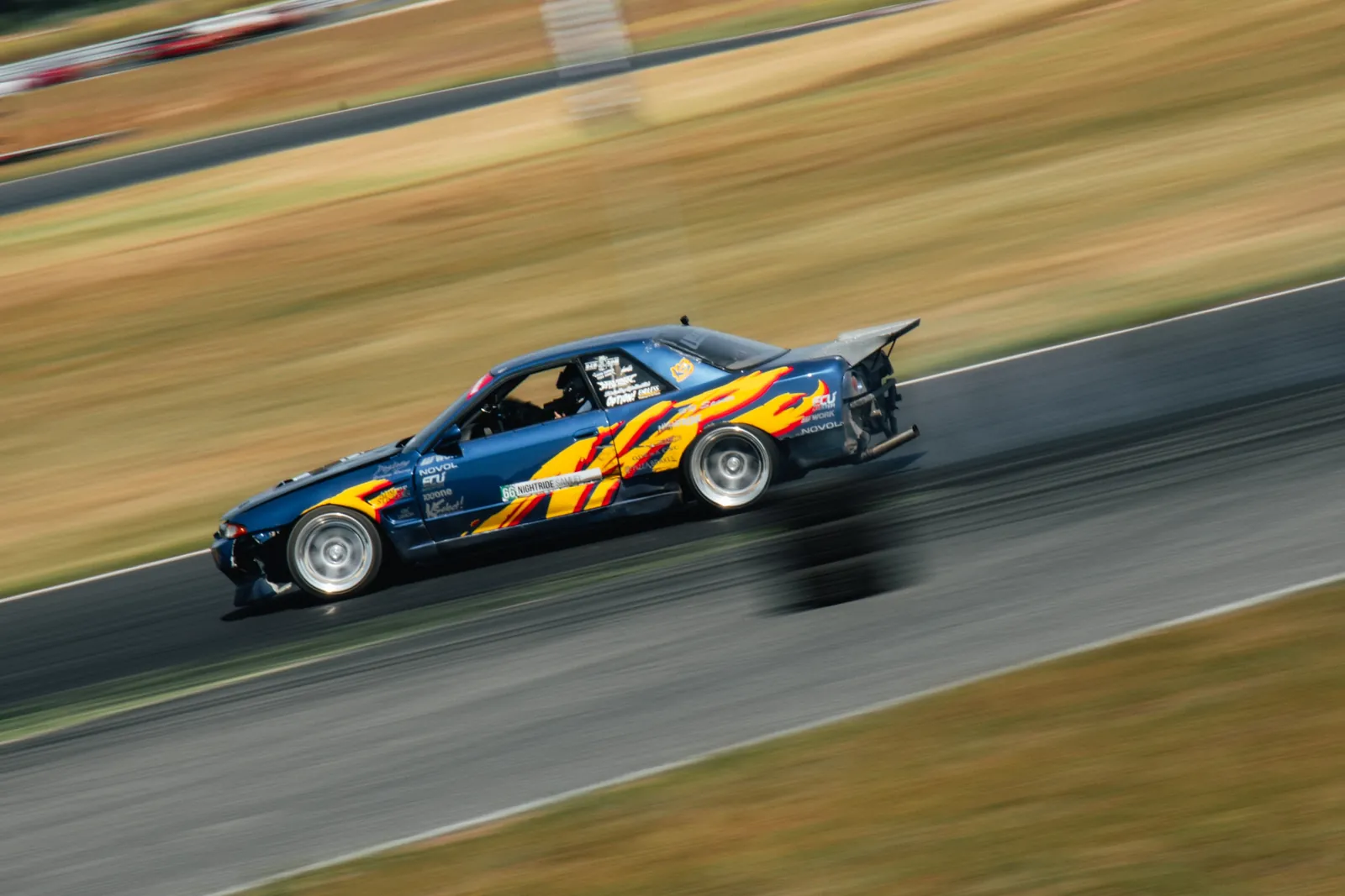 Drift car in motion on circuit
